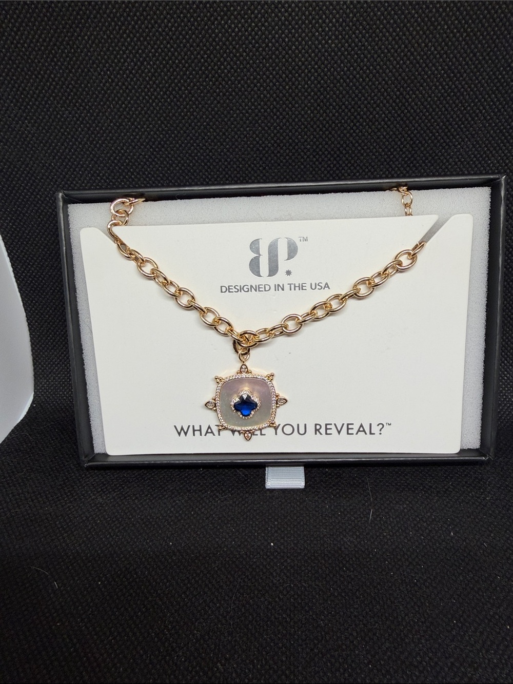 September 26: Sapphire and Mother of Pearl on Gold